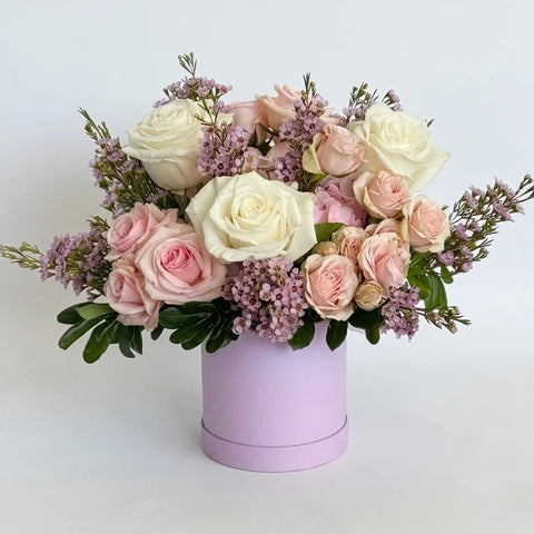 White roses, pink spray roses, and lilac in a round lilac hat box — Rose & Lilac Hat Box by Florent Floral Newmarket