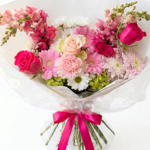 Blush Rose Bouquet with blush pink, hot pink, white, and green flowers by Florent Floral in Newmarket