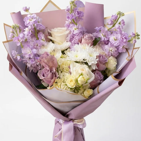 Lilac Cloud Bouquet with lilac, lavender, white, cream, and sage green flowers by Florent Floral in Newmarket