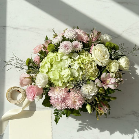 Garden Party Centerpiece with green hydrangeas and pink chrysanthemums top view - Florent Floral