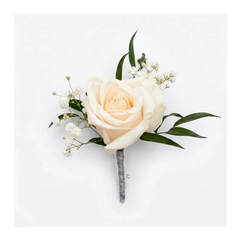 Ivory rose boutonniere with baby breath style filler and pearl pin by Florent Floral in Newmarket
