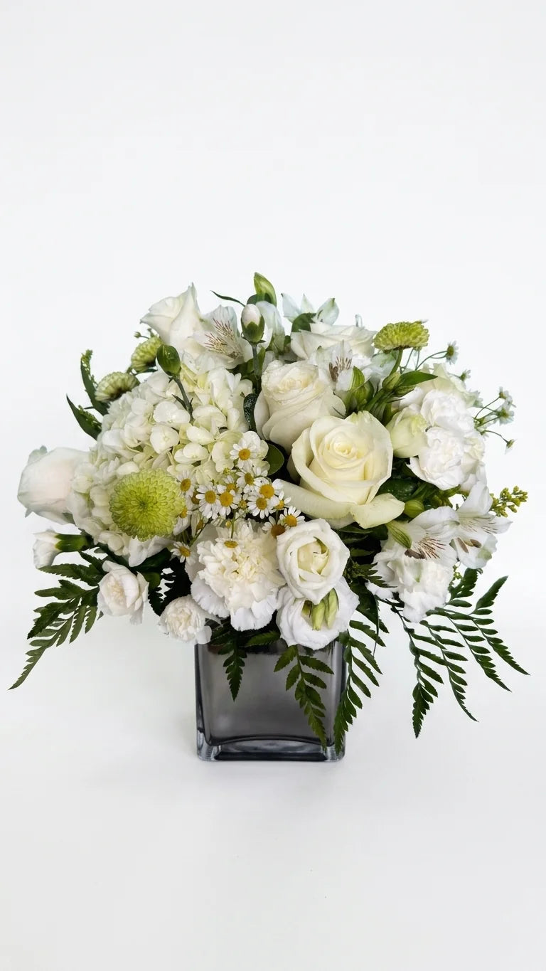 White roses, hydrangea, alstroemeria, and lisianthus in a dark cube vase — White Garden Vase by Florent Floral Newmarket