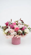 Pink roses, white chrysanthemums, and alstroemeria in a blush velvet round hat box — Pink Velvet Bloom Box by Florent Floral Newmarket