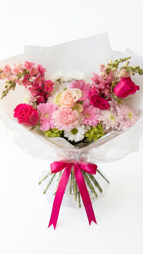 Blush Rose Bouquet with blush pink, hot pink, white, and green flowers by Florent Floral in Newmarket