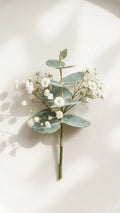 Eucalyptus Boutonniere by Florent Floral with silver dollar eucalyptus with baby’s breath for prom in Newmarket.