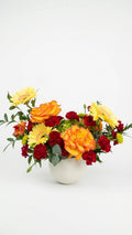 Orange rose and gerbera vase arrangement for birthday flower delivery in Newmarket Ontario