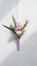 Pink Statice Boutonniere by Florent Floral with pink statice with greenery and small accent stems for prom in Newmarket.