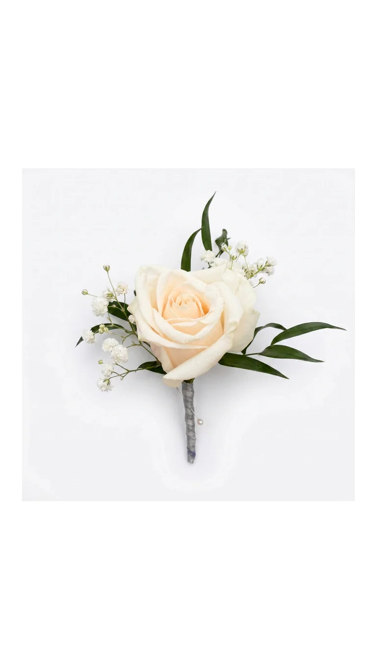Ivory rose boutonniere with baby breath style filler and pearl pin by Florent Floral in Newmarket