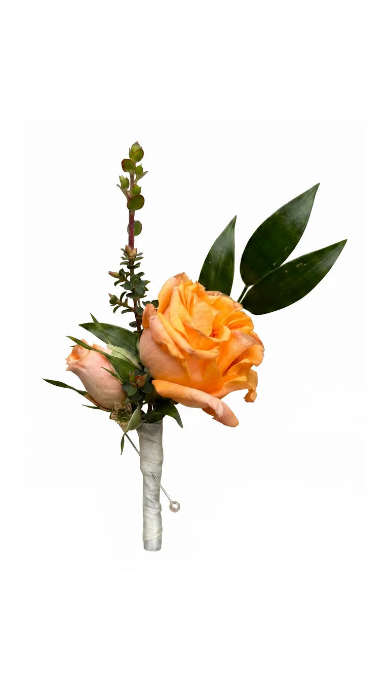 Orange-peach rose boutonniere with wrapped stem and greenery by Florent Floral Newmarket