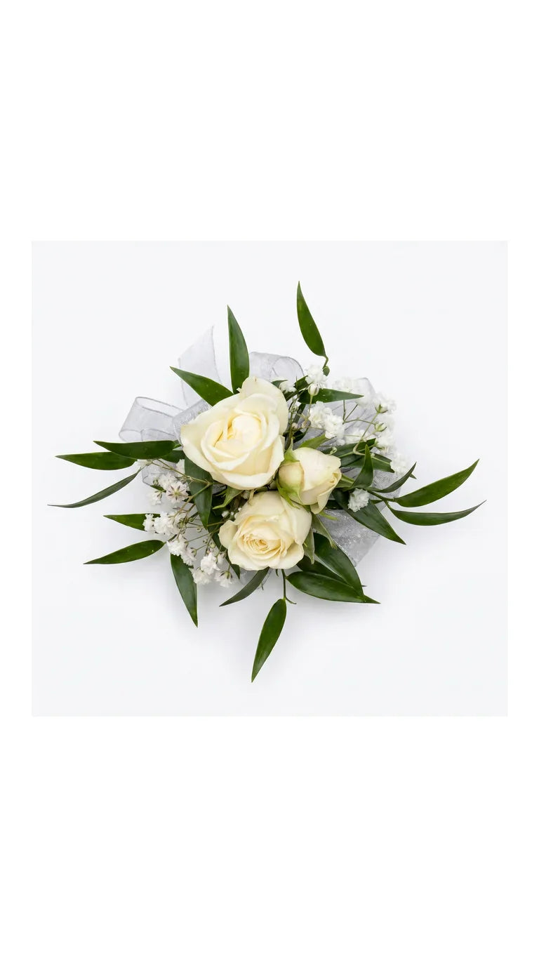 Ivory rose wrist corsage with silver-white ribbon and greenery by Florent Floral Newmarket