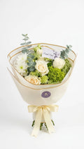 White Meadow Bouquet with white, ivory, green, and soft blue-green flowers by Florent Floral in Newmarket